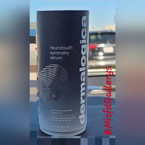 Dermalogica Neurotouch Symmetry Serum in Black and Gray